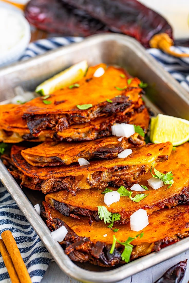 a pan filled with food on top of a table