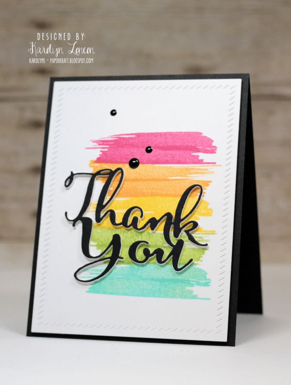 a handmade thank card with the words thank you written in black ink on it