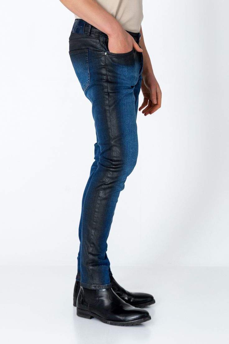 Elevate your denim game with our Side Waxed Tapered Jeans, the epitome of urban sophistication and contemporary style. Crafted from premium quality denim, these jeans offer both durability and comfort for all-day wear. The defining feature of these jeans is the meticulously applied waxed detailing along the side seams, adding a touch of refinement and modern edge to the classic denim silhouette. Whether you're dressing them up with a crisp button-down shirt for a night out or keeping it casual w Modern High Rise Blue Jeans, Modern Blue Bottoms With Five Pockets, Modern Blue Denim Pants, Modern Denim Blue Jeans With Standard Cut, Modern Recycled Denim Bottoms In Blue, Modern Blue Recycled Denim Bottoms, Modern Dark Wash Denim Jeans, Modern Dark Wash Jeans, Modern Leather Jeans For Fall