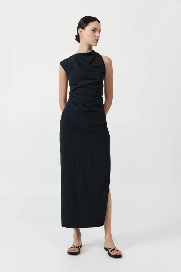 Inspired by a grecian drape, the Asymm Tuck Dress follows the natural shape of the 100% recycled nylon fabric. Crafted with an asymmetric neckline, ruched draping, cutout back and maxi length, the Asymm Tuck Dress cuts a slim, fitted silhouette for an elegant and elevated approach to styling. 100% recycled nylon Hand w Tuck Dress, St Agni, Cutout Maxi Dress, Asymmetric Neckline, Denim Outerwear, Vintage Wardrobe, Knitwear Dress, Mid Dresses, Nylon Fabric