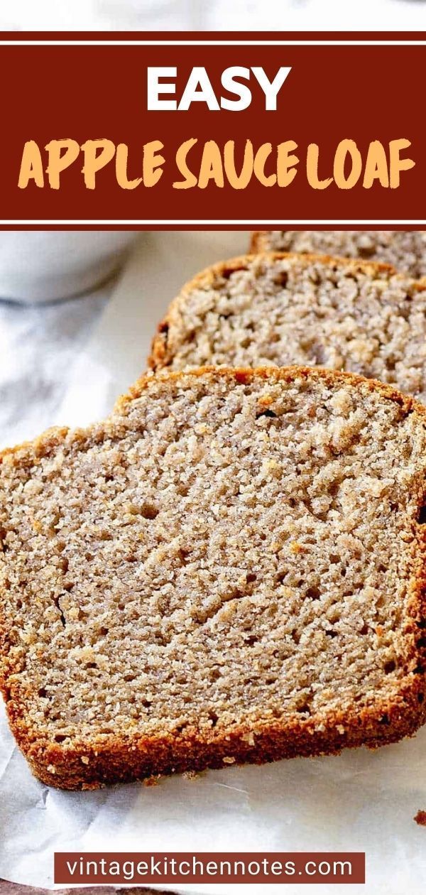 two slices of apple sauce loaf sitting on top of a piece of waxed paper