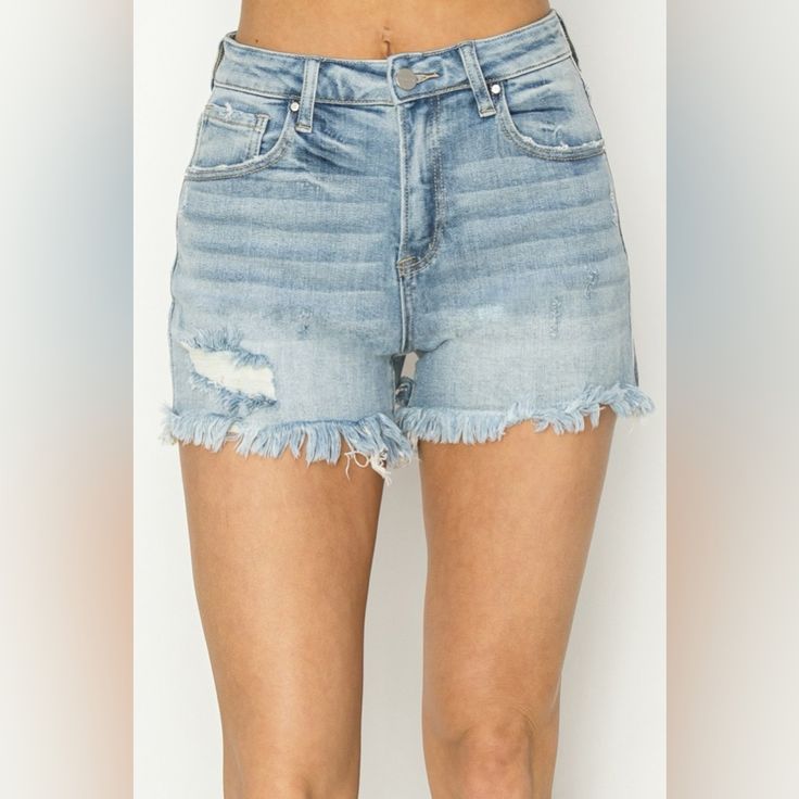 These Raw Hem Denim Shorts Are A Stylish And Casual Addition To Your Summer Wardrobe. The Raw Hem Detailing Adds A Cool And Edgy Touch To The Classic Denim Shorts Design. Made From A Comfortable And Durable Denim Material, These Shorts Are Perfect For Everyday Wear. The Versatile Length Makes Them Easy To Pair With A Variety Of Tops And Shoes. Pair Them With A Graphic Tee And Sneakers For A Laid-Back Look, Or Dress Them Up With A Blouse And Sandals For A Chic Outfit. Elevate Your Summer Style Wi High Rise Washed Blue Shorts With Frayed Hem, Short Length Denim Jeans With Frayed Hem, High Waist Washed Blue Jean Shorts With Frayed Hem, Washed Blue High Rise Shorts With Frayed Hem, High Rise Washed Blue Jean Shorts For Spring, Medium Wash Denim Bottoms With Frayed Hem, High Rise Washed Blue Jean Shorts With Frayed Hem, High Rise Washed Blue Denim Jean Shorts, Washed Blue Denim Jean Shorts