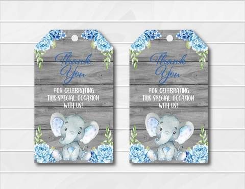 two tags with an elephant and blue flowers on them, one has the words thank you for