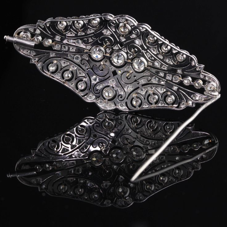 Stunning Art Deco Platinum & Diamond Brooch with beautiful delicate filigree work and milgraining. Item #JP-P0011 Metal: Platinum Weight: 17.3 Grams Diamond Weight: Approximately 4 cts of old european cut & rose cut diamonds Diamond Color: I Diamond Clarity: SI2 Measurements: 33 x 70 mm Layaway: For your convenience, we will be happy to provide layaway payment options. Please contact us to work out a layaway plan which best suits your needs. All layaway purchases are final sale. All dome Wedding Band Engraving, Diamond Brooch, Antique Art Deco, One Ring, Diamond Fashion, Rose Cut Diamond, Antique Art, Diamond Clarity, Rose Cut