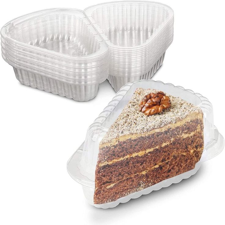 a piece of cake sitting on top of a plastic plate next to two plastic containers