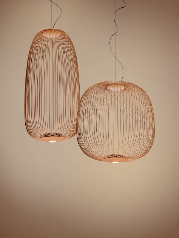 two pendant lights hanging from the ceiling