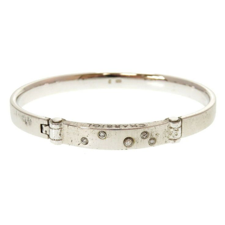 Used Philippe Charriol Charriol Silver 925 Bangle (Sku: Gzxux0) === General === Brand : Philippe Charriol === Design === Type : Bangle Gender : Women Material : Silver 925 Color : Silver === Size === Length : 18cm / 7.08'' Width : 6mm / 0.23'' === Included Items === Accessories : Dust Bag Accessories Notice : Before Purchasing, Please Refer To The Images Of The Accessories Included With The Item. === Condition === Condition : Used (Good) Ranking : Rank B Used - Traces Of Usage, Damages / Dirt Can Be Seen But It Is Still In Acceptable Condition For Continued Usage Seller Ranking : Rank B Overall Scratches : Slight Overall Dirt : Slight Overall Traces Of Use : Slight Condition Notic Everyday Silver Bracelets With Single Cut Diamonds, Luxury Brand, Silver 925, Dust Bag, Bag Accessories, Overalls, Bangles, Women Jewelry, Silver