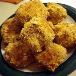 some fried food is on a plate and ready to be eaten