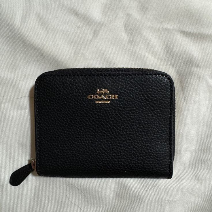 Never Used Brand New Classic Compact Coach Coin Purse, Classic Coach Coin Purse With Coin Pocket, Classic Coach Coin Purse, Coach Black Wallets With Card Slots, Classic Coach Leather Coin Purse, Classic Coach Wallet With Zipper Closure, Black Coach Wallets With Card Slots, Classic Coach Wallets For Everyday Use, Classic Coach Everyday Wallets