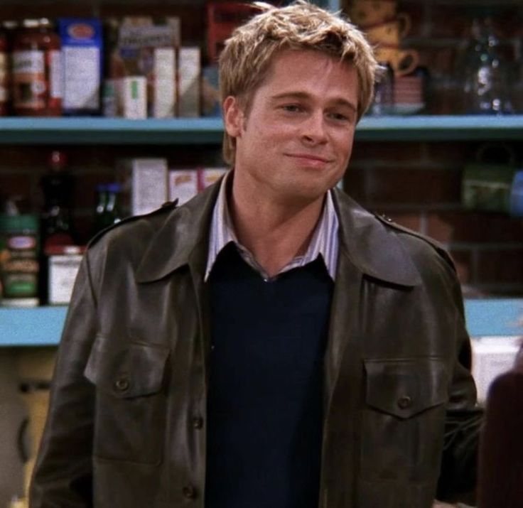 a man standing in front of a store shelf