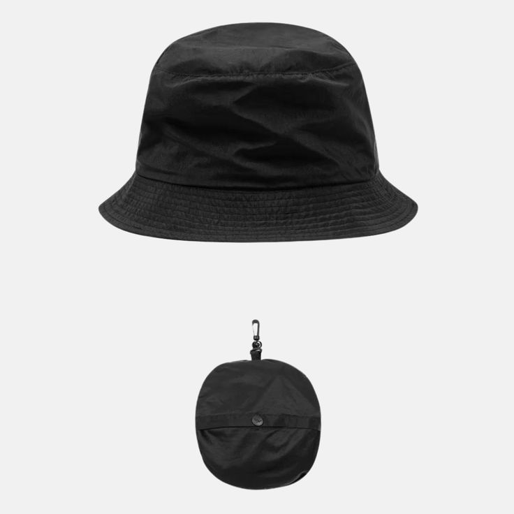 Style No. 140024-BLK Color: Black The Planes Packable Bucket hat folds into a neat traveling mode for your next trip. It is made of nylon with an encased bungee cord and branded stopper for easy adjusting. Once packed, it has a snap hook for convenient attachment to your bag or belt loop. Paper Planes Packable Bucket Hat. Paper Planes, Bungee Cord, Paper Plane, You Bag, Bucket Hat, Hats, Color, Black