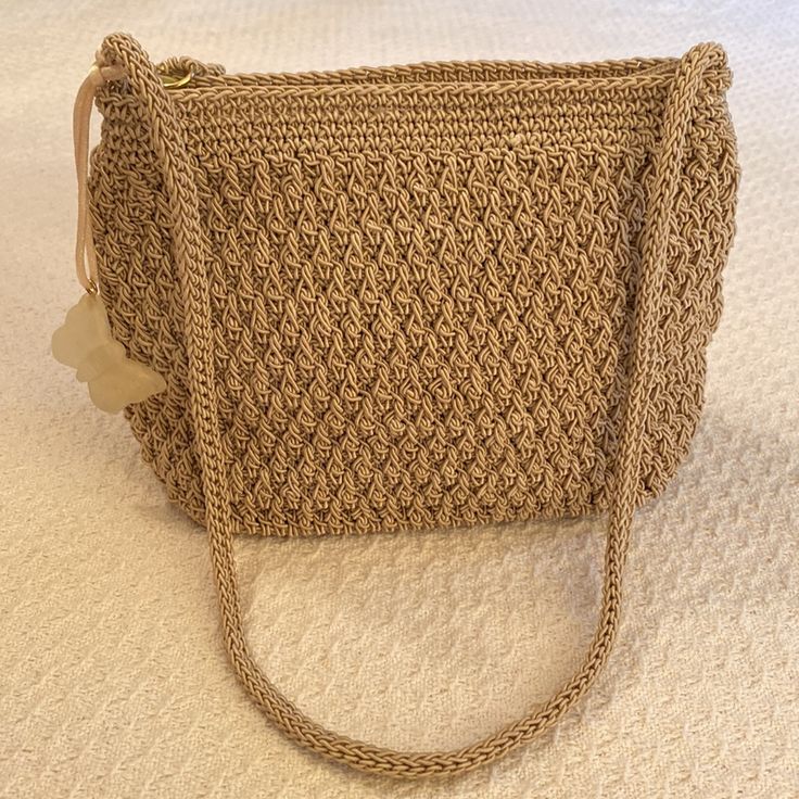 In Nwot Condition, This Beautiful Little Bag Measures 9 X 6” And Has A 24 1/2” Strap. Beige Rectangular Bucket Bag For Everyday Use, Rectangular Beige Bucket Bag For Everyday Use, Beige Rectangular Shoulder Bag For Everyday Use, Rectangular Beige Shoulder Bag For Everyday Use, Natural Pouch Shoulder Bag For Daily Use, Natural Color Shoulder Bag For Everyday Use, Everyday Handheld Straw Bag, Daily Use Natural Color Pouch Shoulder Bag, Large Capacity Natural Hobo Crossbody Bag