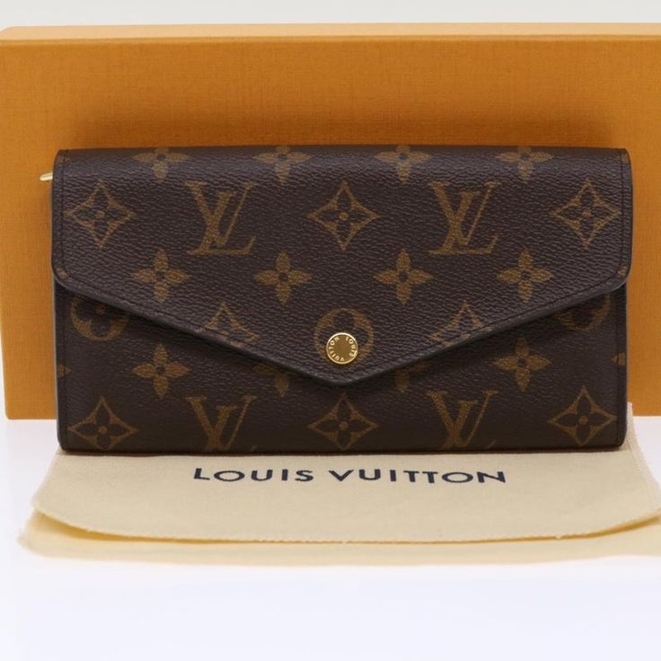 LOUIS VUITTON Monogram Portefeuille Sarah Long Wallet M60531 LV Auth 49959A   BRAND : LOUIS VUITTON    Color : Monogram    Material : Monogram Canvas     Size(cm) : W19cm x H10.5cm x D2.5cm(Approx)    Size(inch) : W7.5 x H4.1 x D1.0inch(Approx)    Style : Long Wallet    Comes with : Dust Bag / Item Box    Serial No. : CA1146    Made in : Spain       This item has been used and may have some minor flaws. Before purchasing, please refer to the images for the exact condition of the item.  We cannot confirm the time period listed.  A return request must be submitted within 48 hours after delivery. Customer is responsible for return shipping costs and fees. Estimated return shipping costs for this item are $80. Contact Our Customer Support for details.  This item ships internationally and will Lv Wallet Women, Luis Vuitton Wallet Women, Lv Wallet Women Louis Vuitton, Louis Vuitton Wallet Women Louis Vuitton Official, Silver Wallet, White Wallet, Wallet Louis Vuitton Official, Goyard Wallet, Bottega Veneta Wallet