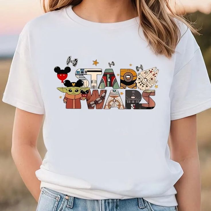 Star Wars Disney T-Shirt Experience the epitome of casual style with our 2D T-Shirts. Crafted for comfort and showcasing unique, eye-catching designs, these tees seamlessly blend fashion with everyday wear. The soft, breathable fabric ensures a cozy feel, making it an ideal choice for any occasion. The 2D graphics add a touch of creativity, transforming a basic tee into a statement piece. Express your individuality with a diverse range of designs, from vibrant patterns to minimalist graphics. Ve Disney T-shirt With Sublimation Print For Fan Events, Trendy T-shirt With Character Print For Disney Fan Events, Trendy Character Print T-shirt For Disney Fan Events, Graphic Tee T-shirt For Disney Fan Events, Disney Graphic Print Crew Neck T-shirt, Disney Fan Event Crew Neck T-shirt With Character Print, Sublimation Print Crew Neck T-shirt For Disney Fan Events, Themed Character Print T-shirt For Streetwear, Graphic Tee With Character Print For Disney Fan Events