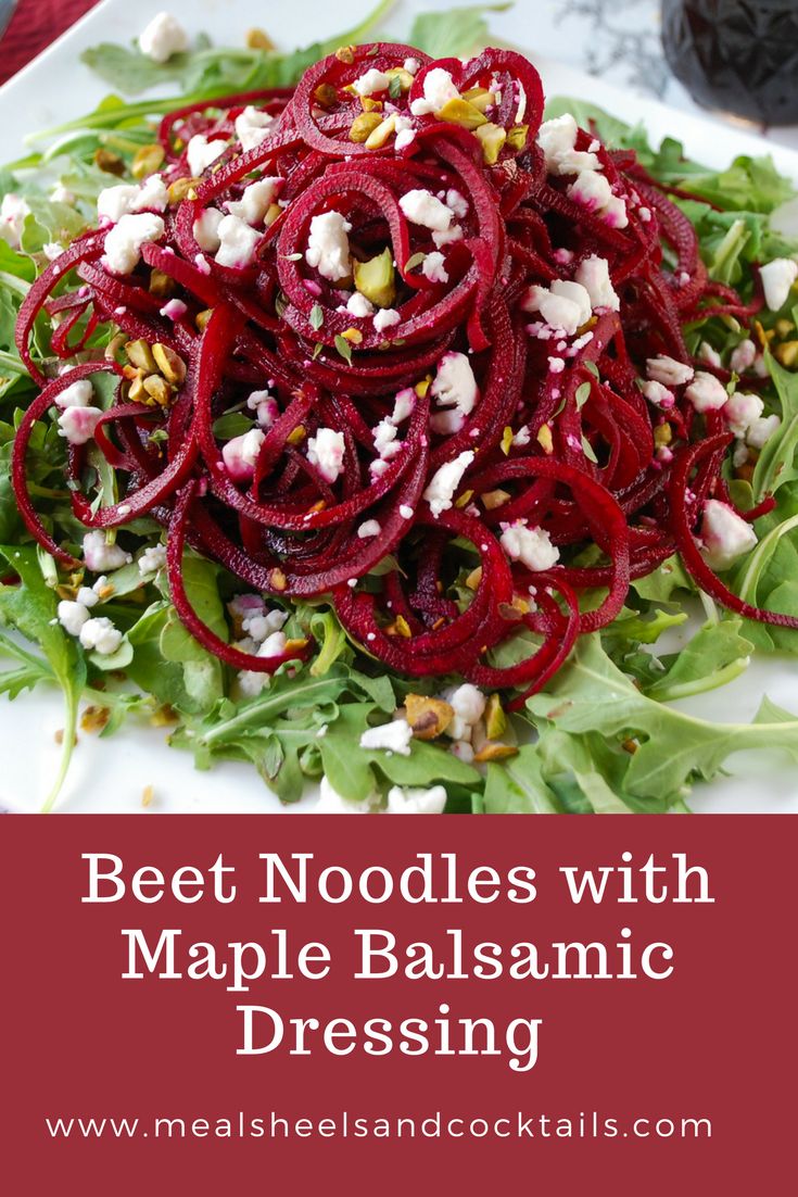 beet noodle salad with maple balsamic dressing on a white platter