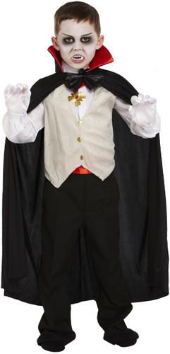 a young boy dressed up as dracula