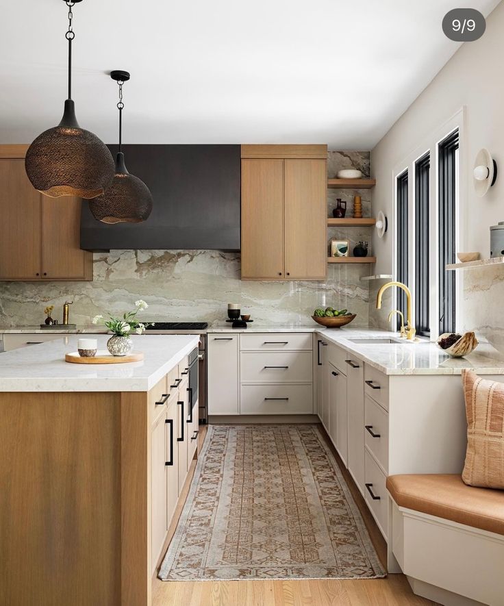 a large kitchen with wooden cabinets and white counter tops, along with an area rug on the floor