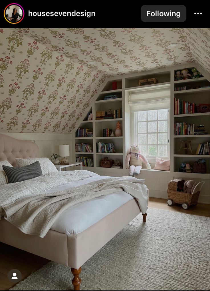 a bedroom with a bed, bookshelf and window in the ceiling is featured on instagram