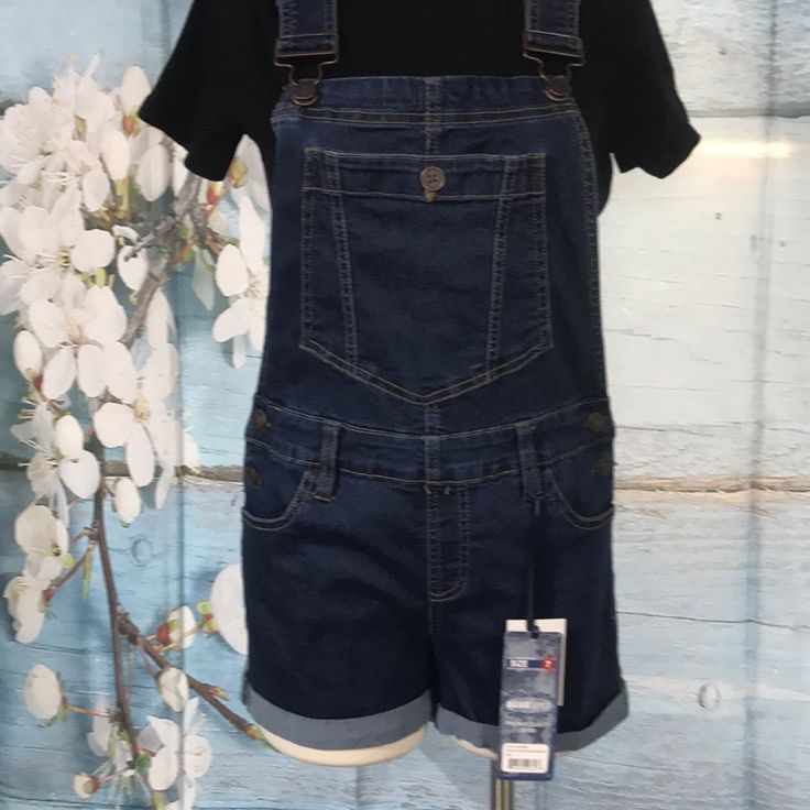 Blue Spice Denim Overall Shorts- Perfect For Summer! Dark Stone Color Style #8912bs9 Waist Measures 16” Length From Top Of Bib To Bottom Of Shorts Hem: 21” Nwt 2 Available Size 7 Juniors Size 9 Juniors Spring Shortalls In Dark Wash, Casual Denim Shortalls, Denim Blue Shortalls With Pockets, Dark Wash High Rise Denim Shortalls, Denim Shortalls With Pockets, Short Denim Shortalls With Pockets, High Rise Dark Wash Denim Shortalls, Casual Blue Short Length Shortalls, Blue Cotton Shortalls