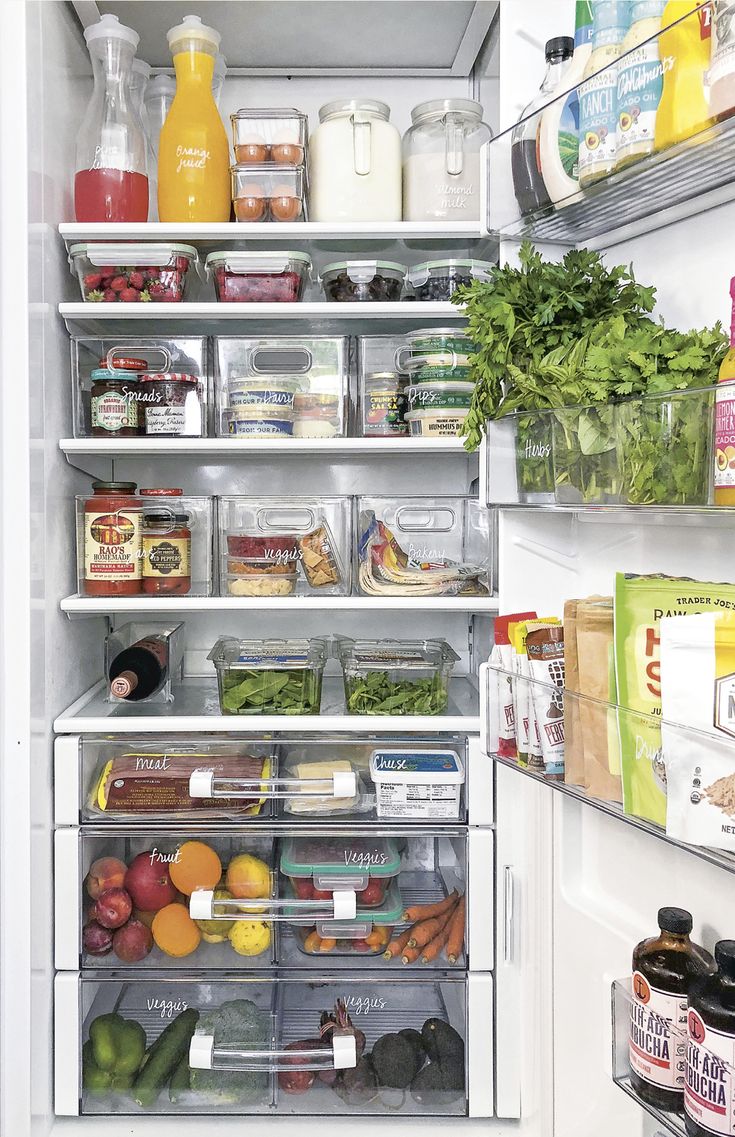 an open refrigerator filled with lots of food