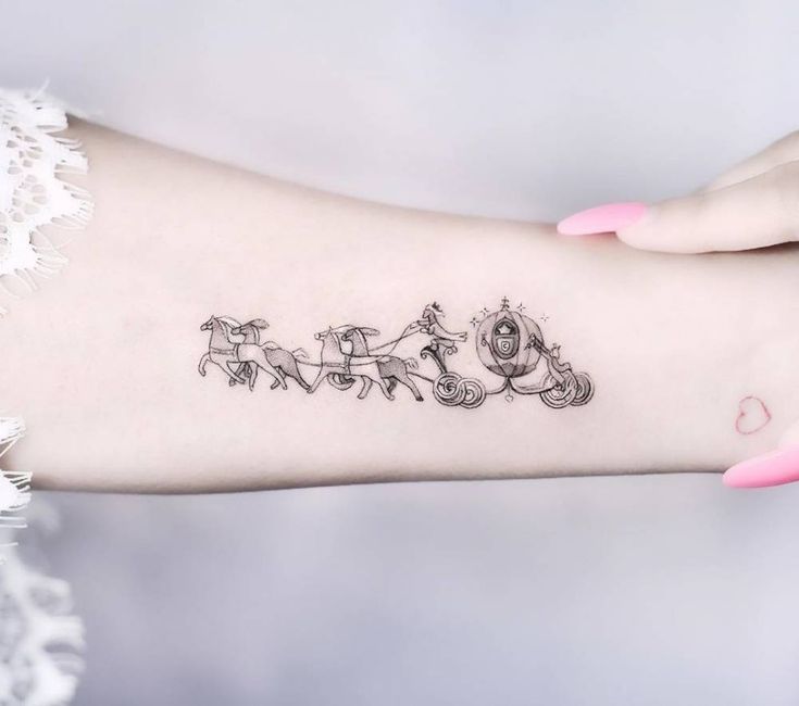 a woman's arm with a tattoo on it that reads, merry go round