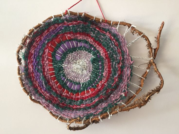 a colorful basket hanging on the wall