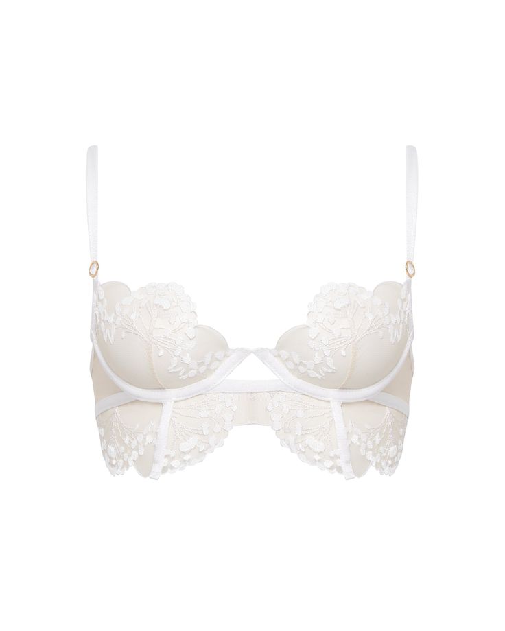 We understand that beauty lies in the details, and the Marisa bra is the perfect example of that. Exquisite floral embroidery adorns this vintage-inspired style, adding a touch of allure and intrigue. Every stitch is meticulously crafted, creating a mesmerising pattern that elevates the bra to a work of art. Whether you're wearing it under a special outfit or simply indulging in a moment of self-admiration, the Marisa bra will make you feel unstoppable. Fitted Balconette Bra With Lace Trim, Delicate Fitted Lace Bra, Delicate Lace Fitted Bra, Fitted Lace Bra In Coquette Style, Elegant Underbust Bodice With Removable Bra Pads, Wedding Bra With Padded Underwire Cups, Fitted Lace Coquette Bra, Wedding Underbust Fitted Bra, Coquette Fitted Lace Bra