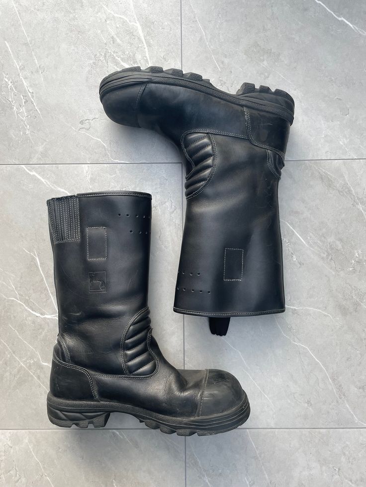 1960s Vintage Fireman Boots  Color: Black  ⌖ Heavy-duty leather ⌖ shaft seams ⌖ Safety steel toe ⌖ leather ankle padding ⌖ Heat-resistant, slip-resistant Nitrile rubber ⌖ shell outsole with air chamber damping ⌖ Pull-on loops ⌖ Height: 13″ Please note all items are examined to the best of our ability. Most items are 20+ years old and are not in perfect condition small imperfections are to be expected any major flaws will be disclosed. Combat Leather Moto Boots With Steel Toe, Industrial Leather Work Boots With Steel Toe, Leather Combat Moto Boots With Reinforced Toe, Black Leather Safety Boots, Industrial Leather Boots With Round Toe, Industrial Style Leather Boots With Round Toe, Industrial Leather Boots With Steel Toe, Combat Leather Boots With Vibram Sole, Industrial Leather Boots With Reinforced Toe