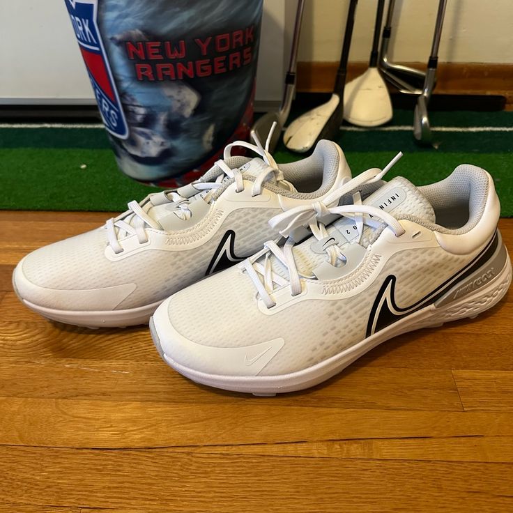 Nike Infinity Pro 2 Golf Shoes Available Size: 9.5, 10, 11 And 12 White And Black Brand New No Box Original Price - $120 Nike White Breathable Golf Shoes, Nike White Running Shoes For Tennis, White Nike Running Shoes For Tennis, Sporty White Golf Shoes With Boost Midsole, White Sporty Golf Shoes With Boost Midsole, Nike Sporty Golf Shoes With Boost Midsole, White Low-top Breathable Golf Shoes, Breathable White Low-top Golf Shoes, White Breathable Low-top Golf Shoes