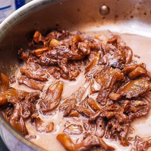 the food is being cooked in the pan on the stove top, ready to be eaten