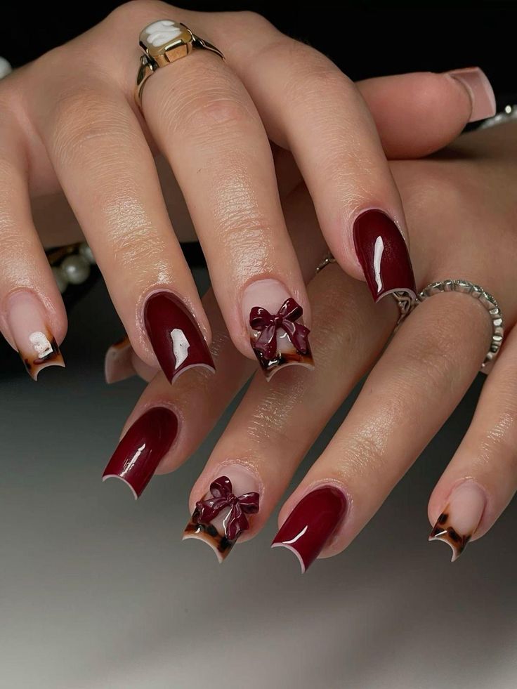 Super cute red nails, with a tortoise shell french tip and red 3D bow. Tortoise Shell French Tip, Red Nail Design, Cute Red Nails, Short Red Nails, Cheetah Print Nails, Acrylic French, Dark Red Nails, Red Christmas Nails, Short Square Nails