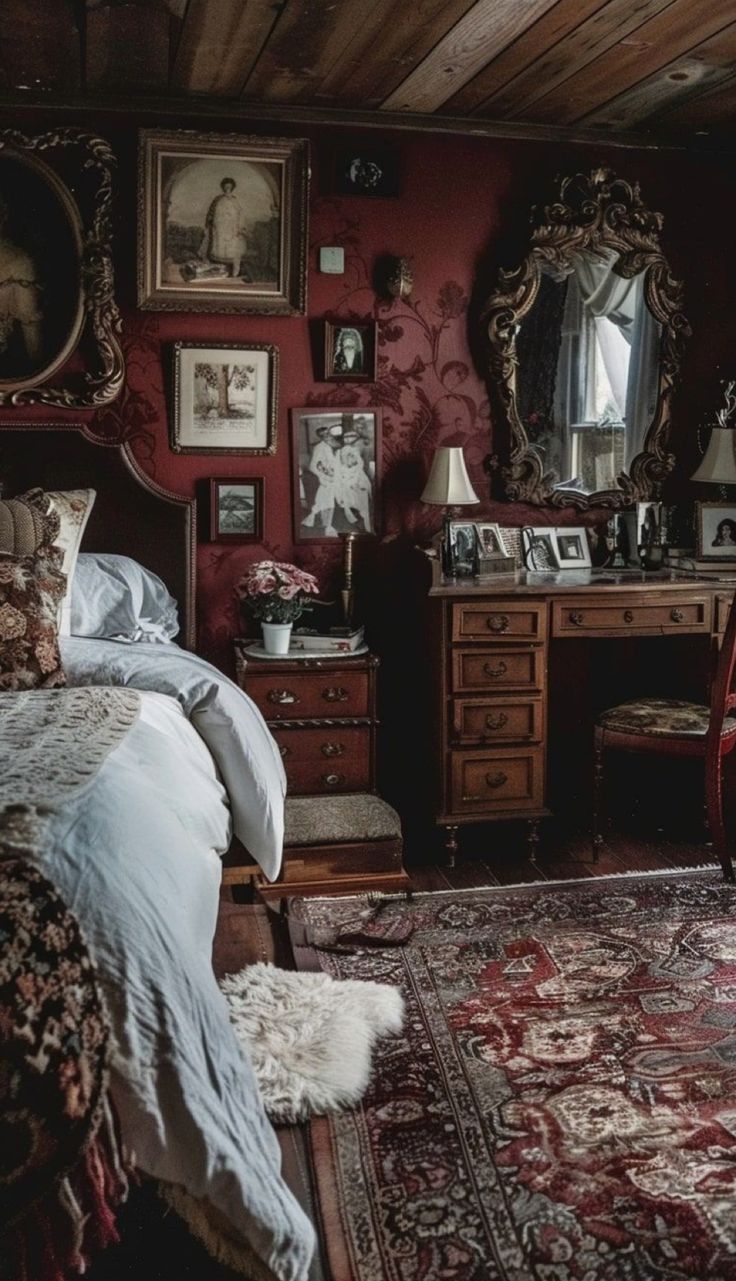 an old fashioned bedroom with red walls and antique furniture, including a large rug on the floor