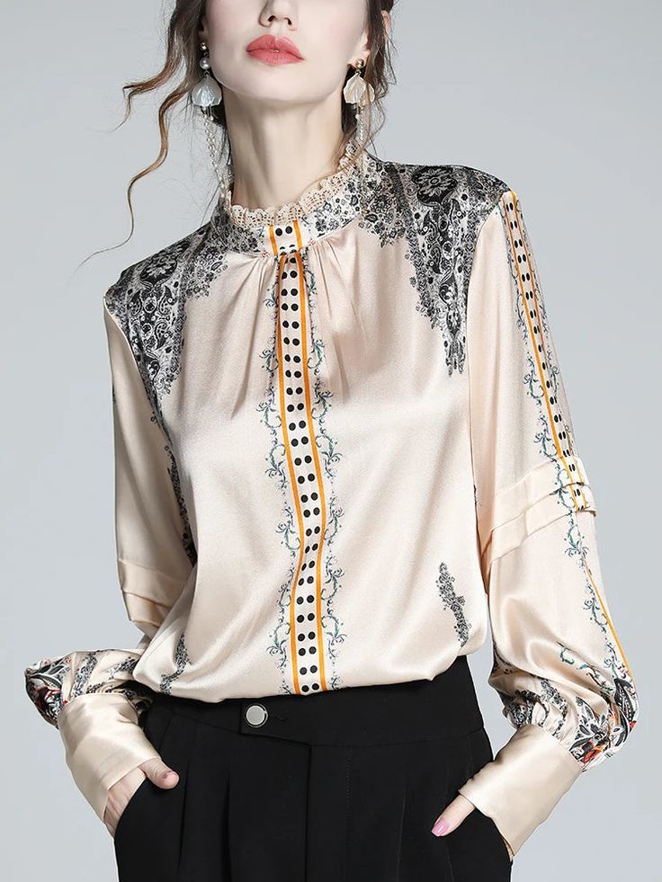 Introducing Our Printed Silk Blouse for Women – Where Luxury Meets EleganceElevate your wardrobe with our Printed Silk Blouse, a sophisticated and stylish addition that combines elegance with effortless charm. Crafted from high-quality silk fabric and adorned with exquisite prints, this blouse is perfect for any occasion.Luxurious Silk FabricOur Printed Silk Blouse is crafted from premium quality silk, renowned for its luxurious feel and delicate drape. Soft against the skin and smooth to the touch, silk offers unmatched comfort and sophistication, making it the ideal choice for a blouse that exudes elegance and refinement.Exquisite PrintsAdorned with beautiful prints, our silk blouse adds a touch of artistry and flair to your ensemble. From bold florals to intricate patterns, each print i Satin Bluse, Turtleneck Shirt, England Fashion, Satin Blouses, Spring Fabric, Lace Patchwork, Satin Shirt, Satin Top, Elegant Shirt