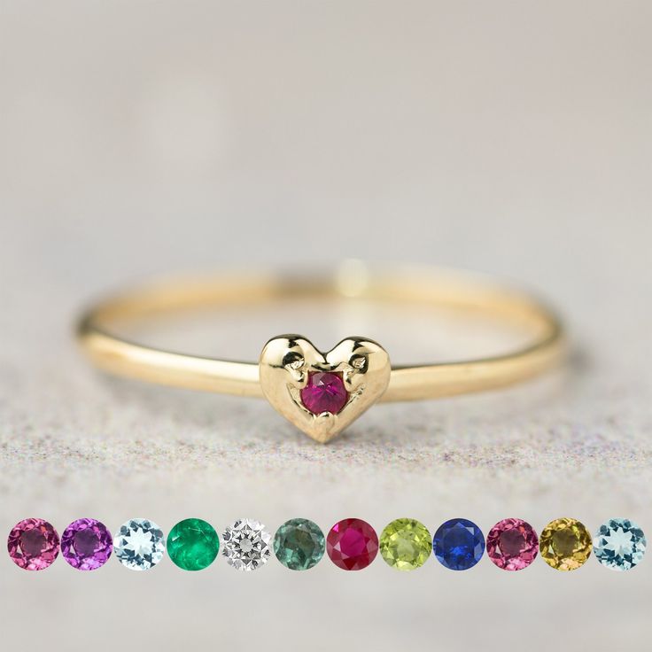 Indulge in sweetness with our natural birthstone heart ring, delicately crafted for everyday wear. Its petite size and simple design make it the perfect complement to any ensemble. Available in 14K solid gold, choose from yellow, rose, or white to suit your style. Stack it with your favorite rings for a personalized touch. Whether it's a gift for yourself or a token of affection for a special someone, this charming ring embodies love and elegance. Perfect for birthdays, anniversaries, or Mother's Day, it's a timeless expression of affection and appreciation. * Heart width x height: ≈5mm x ≈4mm * Band height: ≈1.3mm * Natural birthstone : 2mm * Made of 100% recycled precious metal and ethically sourced gemstone * Comes in a gift box with a bow ready for gifting <> January: Rhodolite Garnet Mother Rings, Rhodolite Garnet, Mini Heart, Ring Size Guide, Favorite Rings, Yellow Rose, Petite Size, Stackable Rings, Pink Tourmaline