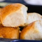 several pieces of bread sitting on top of a blue plate