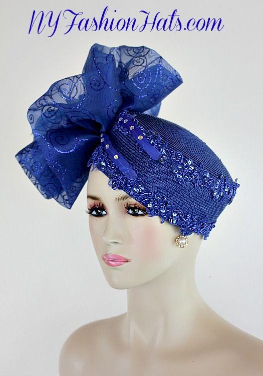 Women's Royal Blue Pillbox Fashion Designer Haute Couture Hat Headpiece Trimmed With A Large Royal Blue Organza Fabric Bow Containing Royal Blue Glitter Spirals. Placed In The Center Of This Beautiful Large Bow Is A Handmade Royal Blue Satin Flower, Accented With Crystal Acrylic Rhinestones And A Glass Rhinestone Center. Two Royal Blue Feathers With Rhinestones Are Placed Along The Front Of This 1920's Flapper Art Deco Era Cocktail Hat. This Formal Hat Can Be Worn In Different Positions. This ladies bespoke formal hat is appropriate to wear for the Kentucky Derby, Melbourne Cup, Royal Ascot, horse races, horse racing, Church, weddings, and special occasion. This lovely hat is also suited for mother of the bride or a bride. This Special Occasion Hat Is Custom Made And Designed By Dress Hats Special Occasion Hats, Fascinator Hats Diy, Formal Hat, Classy Hats, Flapper Art, 1920's Flapper, Church Weddings, Horse Races, Royal Ascot Hats