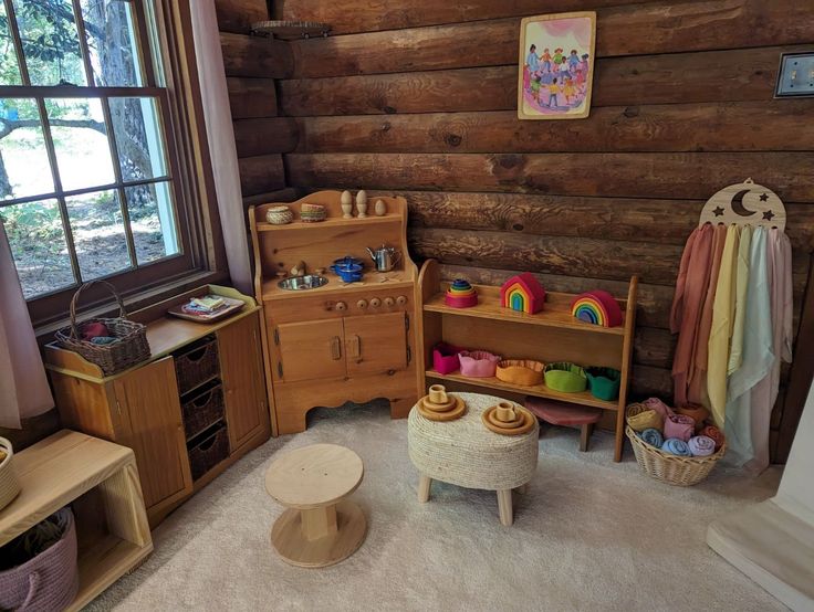 a child's room with wooden walls and flooring