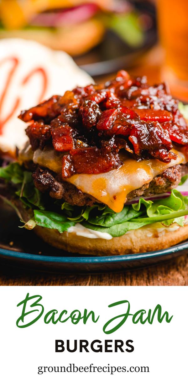 the bacon and cheese burger is served on a bun with lettuce