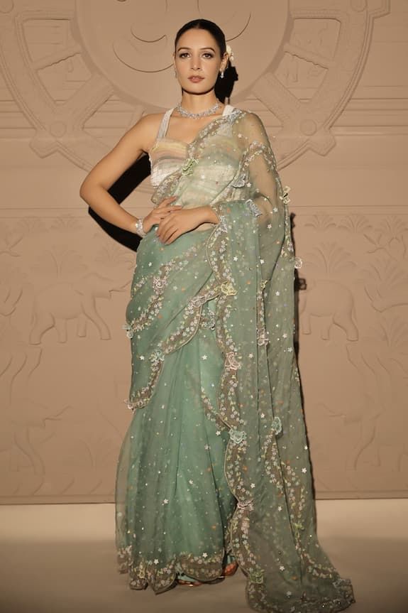 Mint green floral sequin embroidered saree with a scalloped border. Paired with a multi coloured fringed bralette. - Aza Fashions Multi Colour Saree, Farewell Sarees, Embellished Saree, Sarees Traditional, Mehendi Outfit, Sequence Saree, Sequin Saree, Floral Saree, Scalloped Border