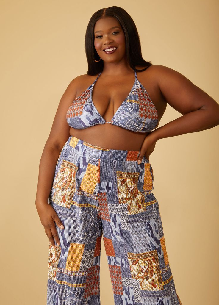 This bralette is crafted from printed pliss�-satin that keeps in toe with the resort trendiness that we love as worn as a three-piece moment with an open-front shirt and straight-leg pants. Chic Rayon Summer Sets, Chic Printed Crop Top For Vacation, Chic Printed Crop Top For Beach, Summer Beach Sets Made Of Rayon, Cropped Beach Sets For Spring, Cropped Beachwear Set For Spring, Cropped Sets For Beach In Spring, Spring Beach Cropped Set, Summer Triangle Top Crop Top For Loungewear