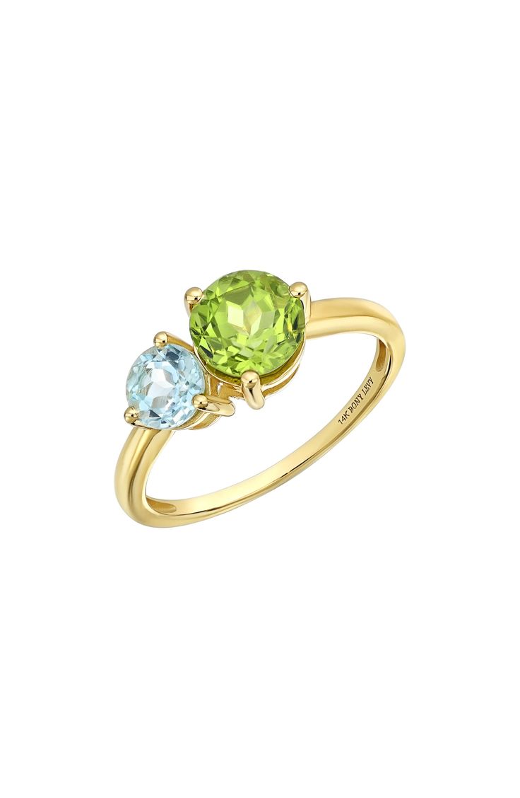 Two prong-set semiprecious stones bring vibrant sparkle to the center of this handcrafted 14-karat-gold ring and adds rich color to any stack. 1/2"W x 1/4"L setting Total stone weight: 1.43ct. 14k gold/blue topaz and peridot, blue topaz and citrine or blue topaz Imported Classic Multi-stone Yellow Gold Gemstones, Classic Yellow Gold Multi-stone Gemstones, Yellow Gold Peridot Rings With Gemstone Accents, Elegant Multi-stone Peridot Gemstones, Peridot Multi-stone Rings For May Birthstone, Yellow Gold Birthstone Gemstones, Round Shape, Yellow Gold Birthstone Gemstone, Fine Jewelry With Peridot Gemstone Accents, Elegant Green Multi-stone Topaz Ring