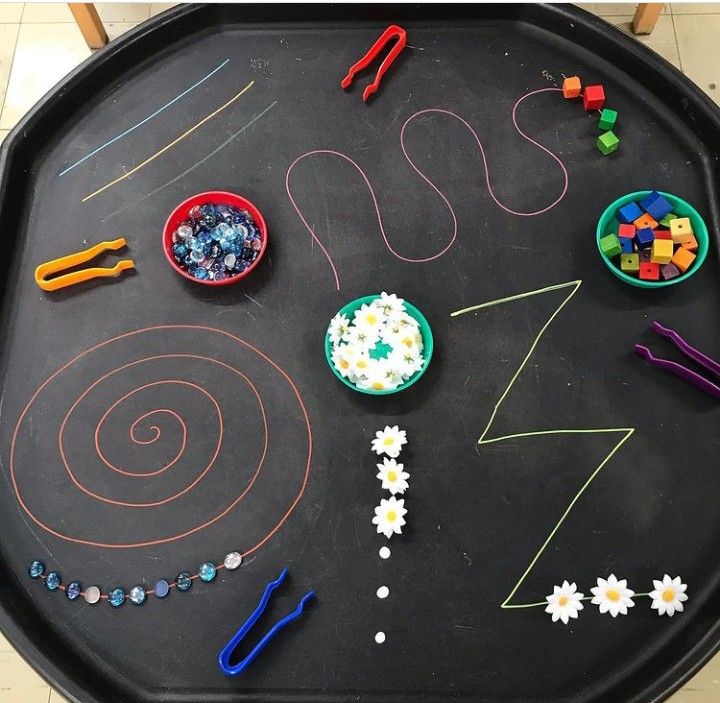 a black tray topped with lots of different items