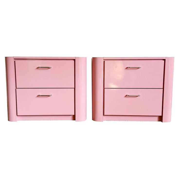 pair of pink nightstands on white background