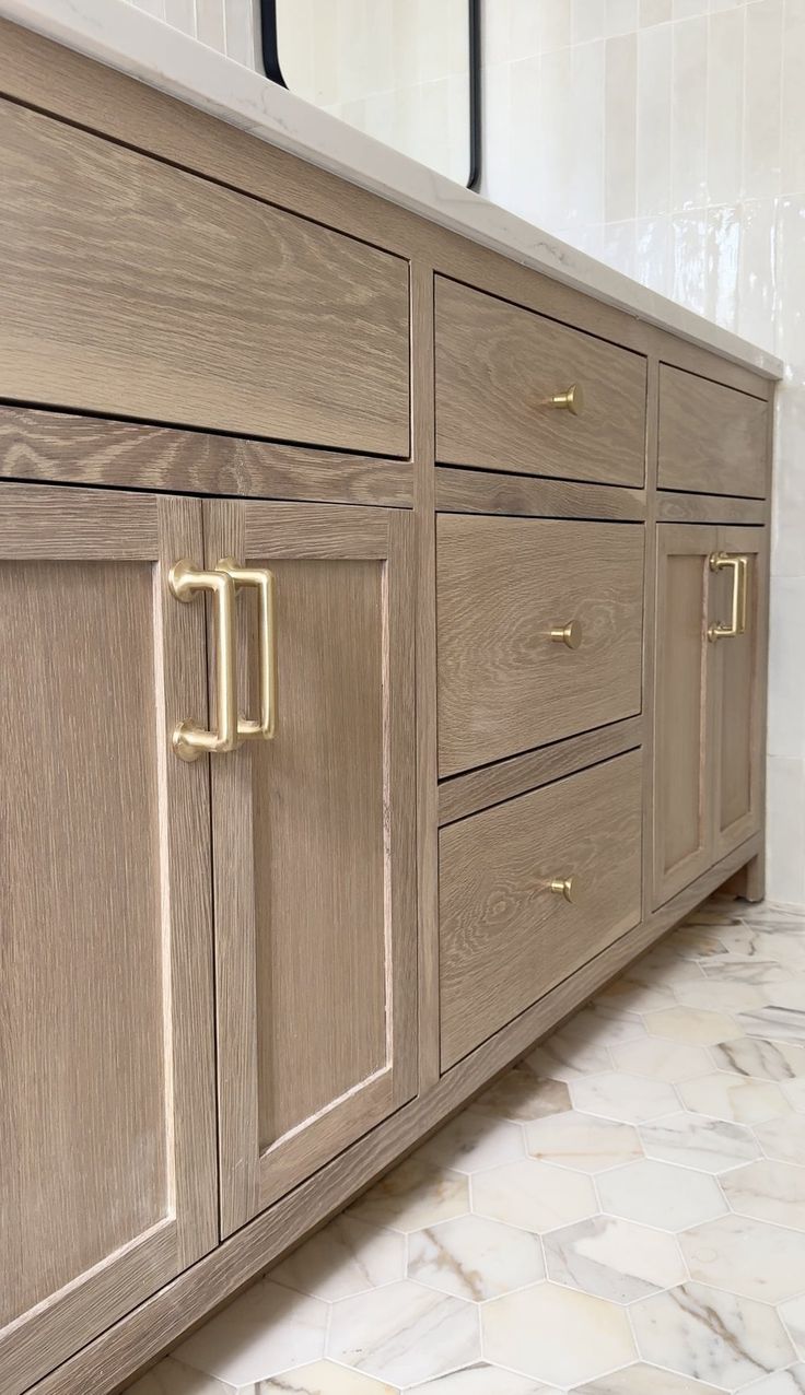 The Perfect Stain For Our White Oak Vanities — designwithbernice Kitchen Cabinets Makeover Stain, Medium Brown Stain On White Oak, Stained Beech Wood Cabinets, White Oak With Gold Hardware, Stained Ash Wood Cabinets, White Oak Bathroom Ideas, Light Stain Colors For Kitchen Cabinets, Marsh Cabinets Galleries, White Oak Stains For Cabinets