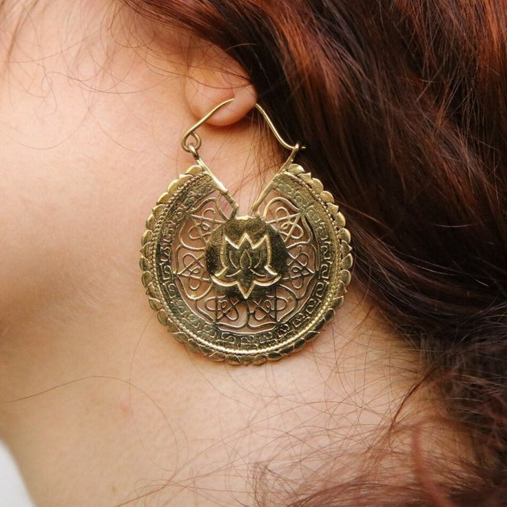 Mandala Earrings handcrafted in India. Does not get oxidize or rust when in contact with water. Nickel Free Made to Order Diameter 43 mm Handcrafted with brass Ships out within 3–5 business days TRIBAL DESERT Symbolic Drop Earrings For Festivals, Symbolic Festival Drop Earrings, Symbolic Gold Earrings For Festivals, Oxidized Teardrop Jewelry For Festivals, Antique Gold Handmade Jewelry For Festivals, Symbolic Metal Earrings For Festival, Symbolic Bronze Jewelry For Festivals, Symbolic Bronze Festival Jewelry, Antique Gold Bohemian Jewelry