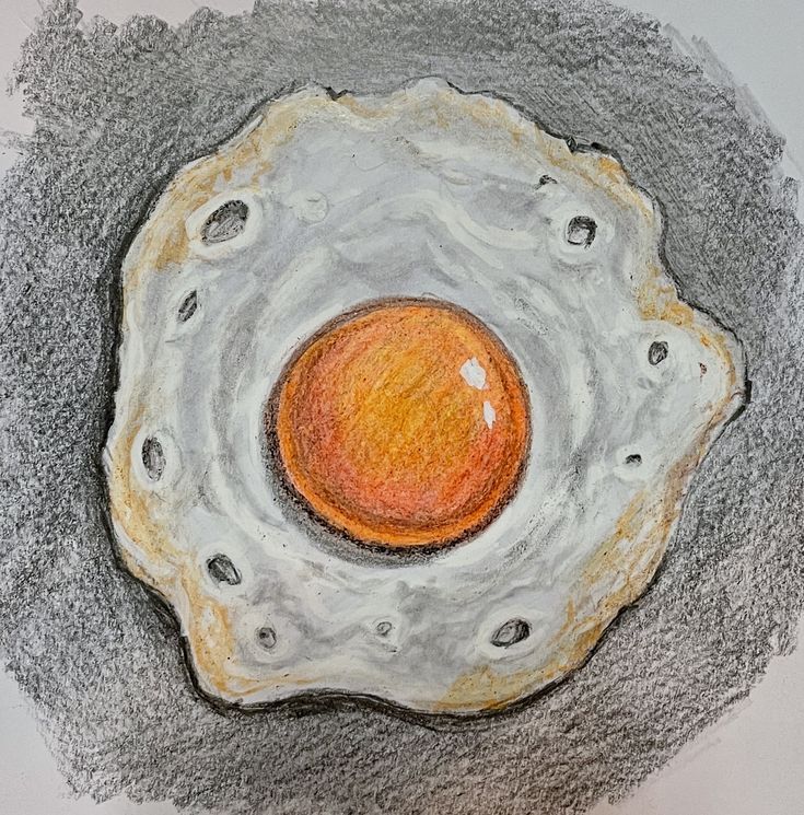 a drawing of an egg on top of a rock