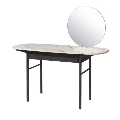 an oval mirror on top of a table with a black metal frame and marble top