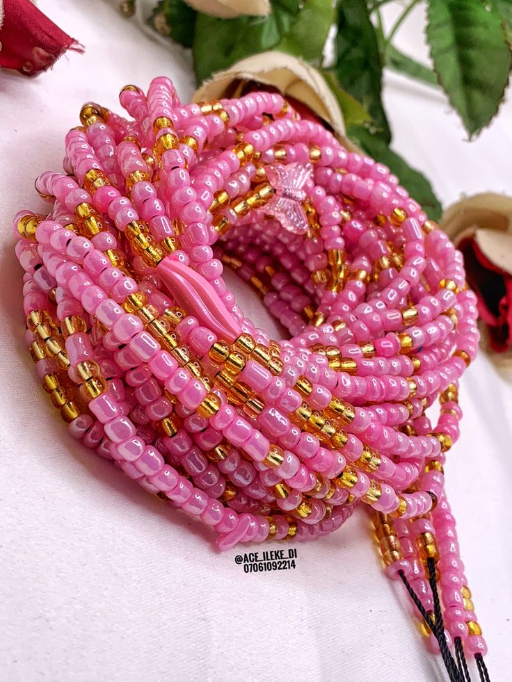 Pink & Gold waist bead set. 

Tie on Waist bead

Type: Seed Bead
Bead Size: 3

#2,500 per Strand 

A Strand is 50 inches long & will go around you once. Gold Waist Beads, Bin Bin, Diy Beaded Bracelets, Beads Craft Jewelry, Beads Craft, Waist Beads, Craft Jewelry, Bead Set, Feel Beautiful