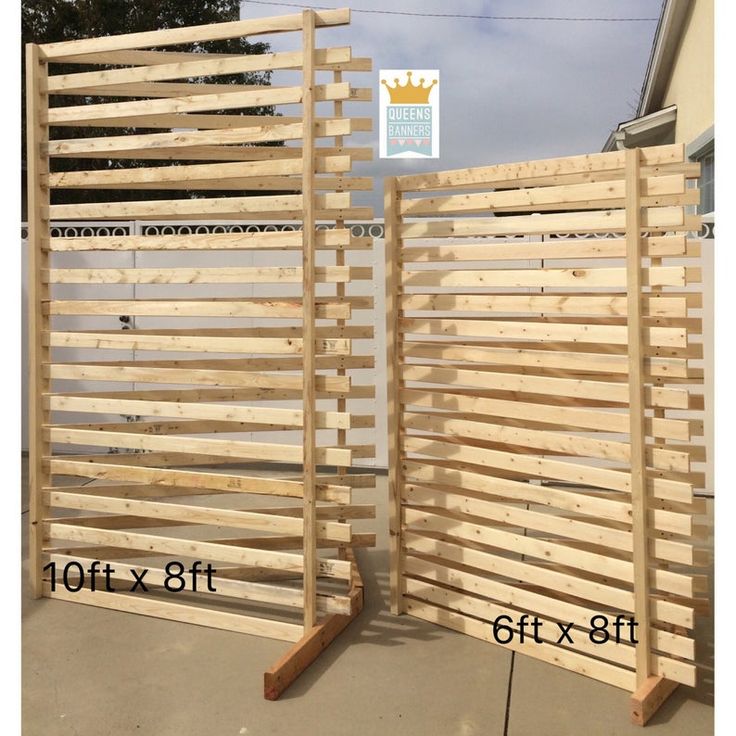 two wooden gates made out of pallet boards