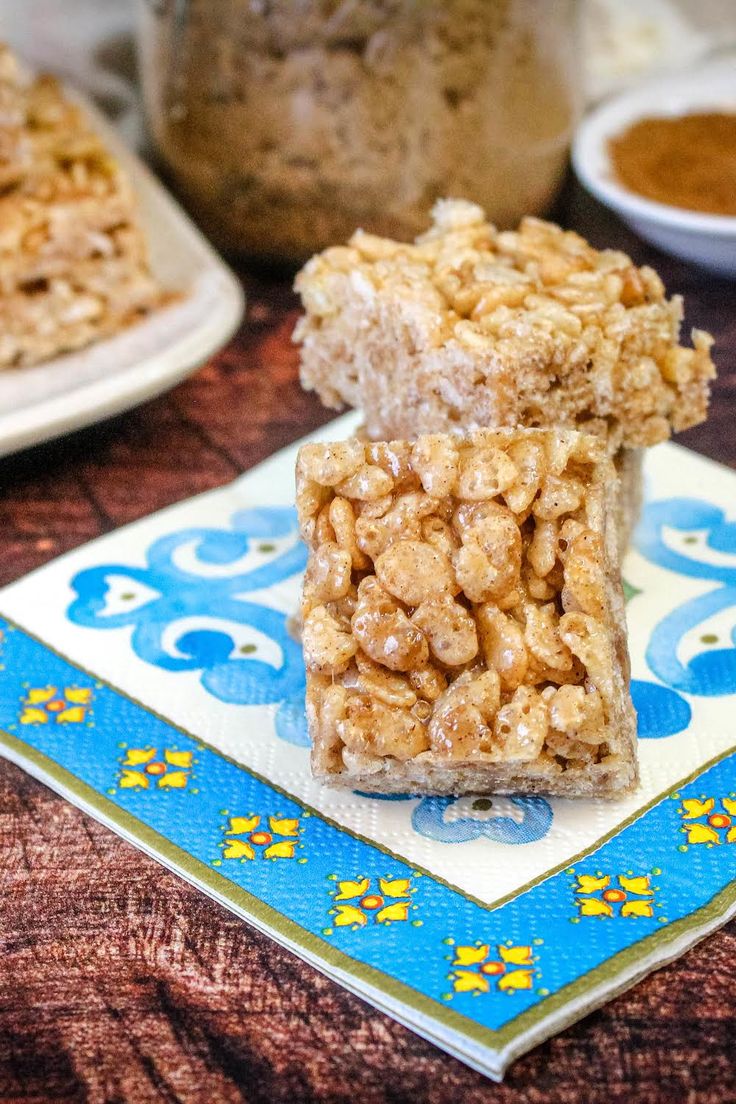 there are two pieces of food on the plate and one is cut in half to look like an oatmeal bar